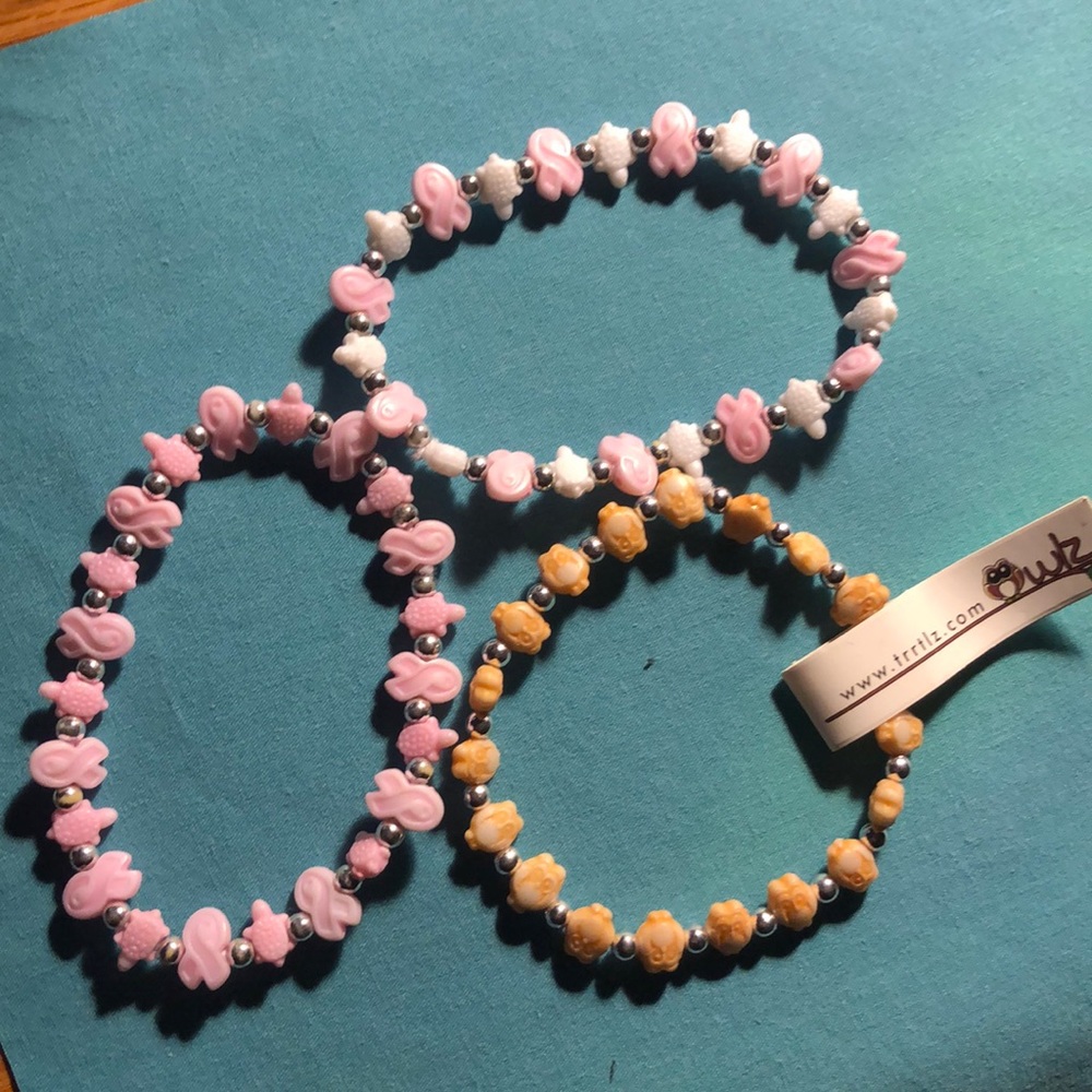 Trtlzz Bracelets 2 turtle and 1 owl.  You get all three